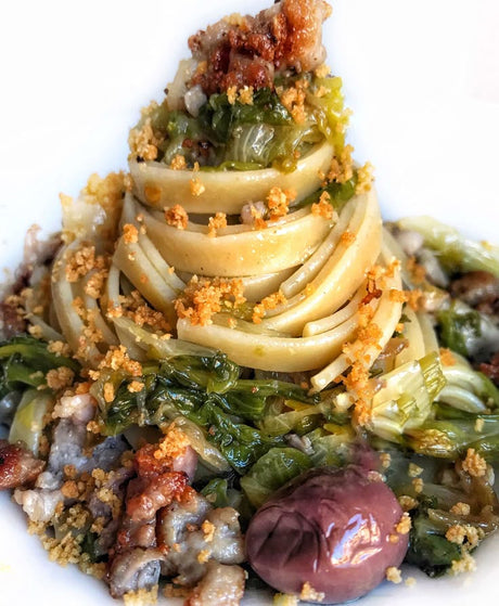 Fettuccine with escarole, sausage, black olives and muddica atturrata