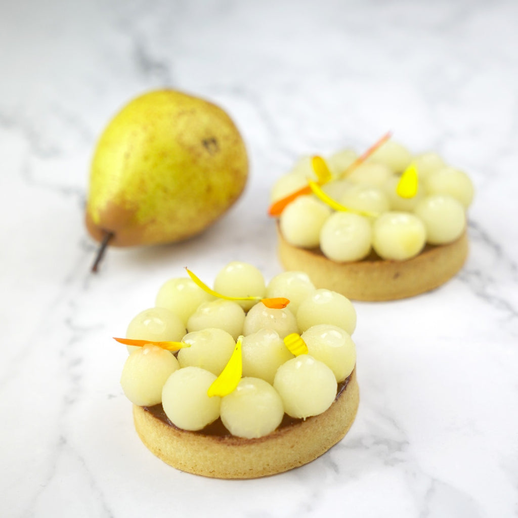 Pear William Mini Ball in Light Syrup
